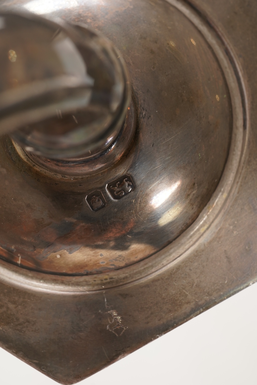 An Elizabeth II silver three branch, three light candelabrum, by William Comyns & Sons Ltd